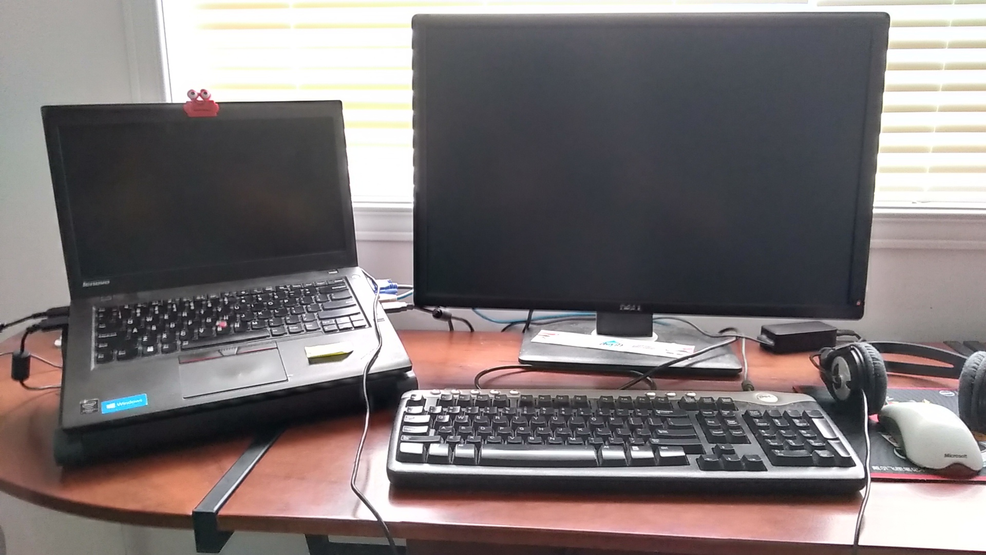My work setup with a Lenovo T450 laptop and Dell 24 inch monitor